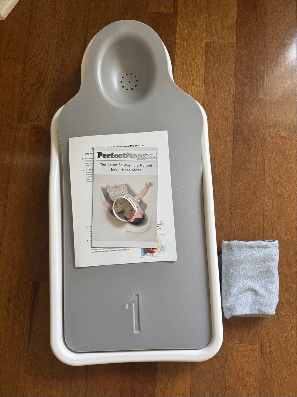 Perfect noggin bed system with gray sheet